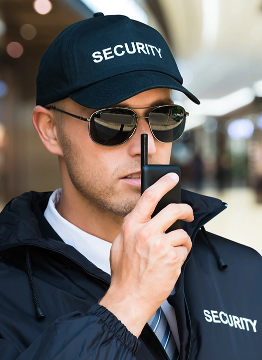 event-male-security-guard-talking-on-walkie-talkie